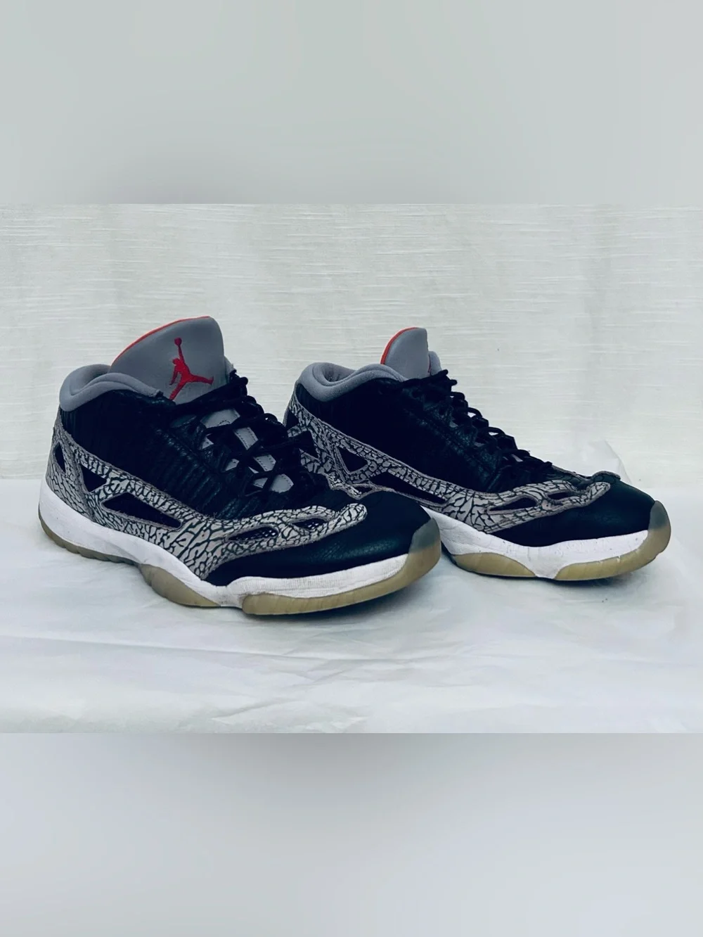 Air Jordan 11 Retro Low IE Men's Black/Grey Sneakers with Red Jumpman Accents